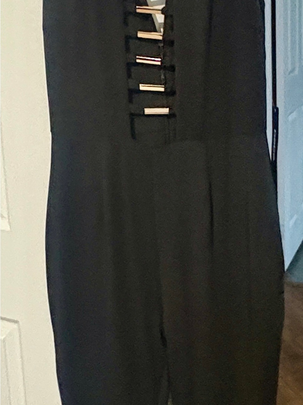 Bebe NWT Black Sleeveless Jumpsuit with Metal Bar Accents